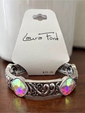 Laura  Ford silvertone  embossed,beveled iridescent stones,stretch bracelet